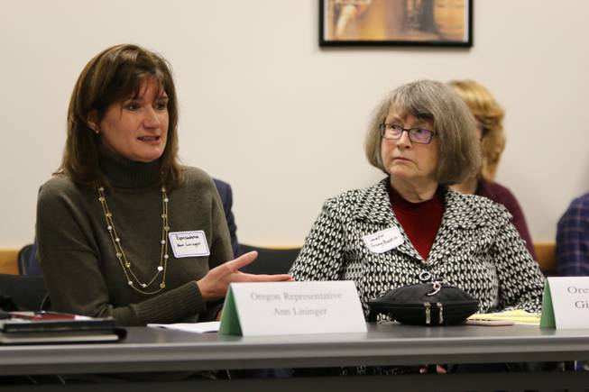 Oregon State Representative Ann Lininger speaks while Oregon State Sen. Ginny Burdick looks on during a meeting with five Nevada state legislators and several more business leaders from Nevada’s marijuana industry on Tuesday, Nov. 29, 2016 at the OLCC headquarters in Portland, Oregon. The Nevada representatives traveled to Portland this week meet with state and city officials for advice on implementing recreational marijuana, and also toured Pure Green Marijuana Dispensary in the afternoon.