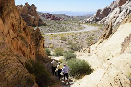 Hikers enjoy the desert in the Gold Butte region Saturday, Oct. 15, 2016, north east of Las Vegas. President Barack Obama designated two national monuments Wednesday, Dec. 28, 2016, at sites in Utah and Nevada, which includes the 300,000-acre area now known as the Gold Butte National Monument.
