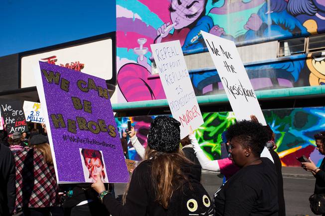 Protesters gathered in downtown Las Vegas on Saturday, Jan. 21, 2017, in support of the Women's March on Washington for the Women's March in Las Vegas. Nevada Congresswomen Dina Titus and Congressman Ruben Kihuen were among some of the speakers to address the crowd as they gathered at Lloyd D. George U.S. Courthouse.