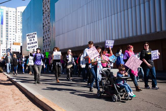 Protesters gathered in downtown Las Vegas on Saturday, Jan. 21, 2017, in support of the Women's March on Washington for the Women's March in Las Vegas. Nevada Congresswomen Dina Titus and Congressman Ruben Kihuen were among some of the speakers to address the crowd as they gathered at Lloyd D. George U.S. Courthouse.