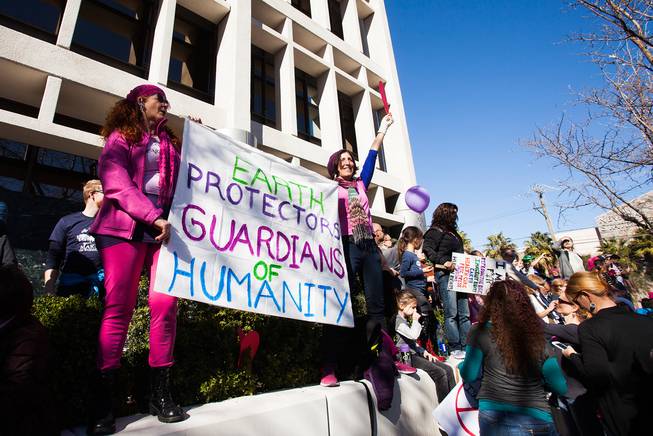 Protesters gathered in downtown Las Vegas on Saturday, Jan. 21, 2017, in support of the Women's March on Washington for the Women's March in Las Vegas. Nevada Congresswomen Dina Titus and Congressman Ruben Kihuen were among some of the speakers to address the crowd as they gathered at Lloyd D. George U.S. Courthouse.