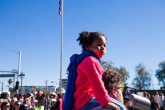 Protesters gathered in downtown Las Vegas on Saturday, Jan. 21, 2017, in support of the Women's March on Washington for the Women's March in Las Vegas. Nevada Congresswomen Dina Titus and Congressman Ruben Kihuen were among some of the speakers to address the crowd as they gathered at Lloyd D. George U.S. Courthouse.