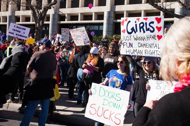 Protesters gathered in downtown Las Vegas on Saturday, Jan. 21, 2017, in support of the Women's March on Washington for the Women's March in Las Vegas. Nevada Congresswomen Dina Titus and Congressman Ruben Kihuen were among some of the speakers to address the crowd as they gathered at Lloyd D. George U.S. Courthouse.