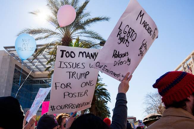 Protesters gathered in downtown Las Vegas on Saturday, Jan. 21, 2017, in support of the Women's March on Washington for the Women's March in Las Vegas. Nevada Congresswomen Dina Titus and Congressman Ruben Kihuen were among some of the speakers to address the crowd as they gathered at Lloyd D. George U.S. Courthouse.