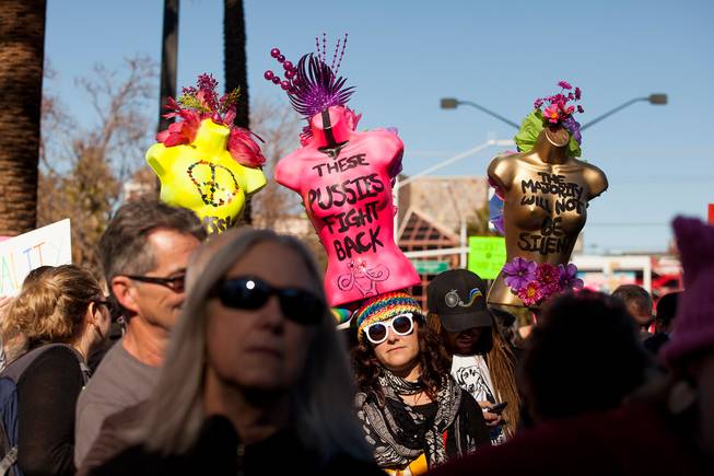 Protesters gathered in downtown Las Vegas on Saturday, Jan. 21, 2017, in support of the Women's March on Washington for the Women's March in Las Vegas. Nevada Congresswomen Dina Titus and Congressman Ruben Kihuen were among some of the speakers to address the crowd as they gathered at Lloyd D. George U.S. Courthouse.
