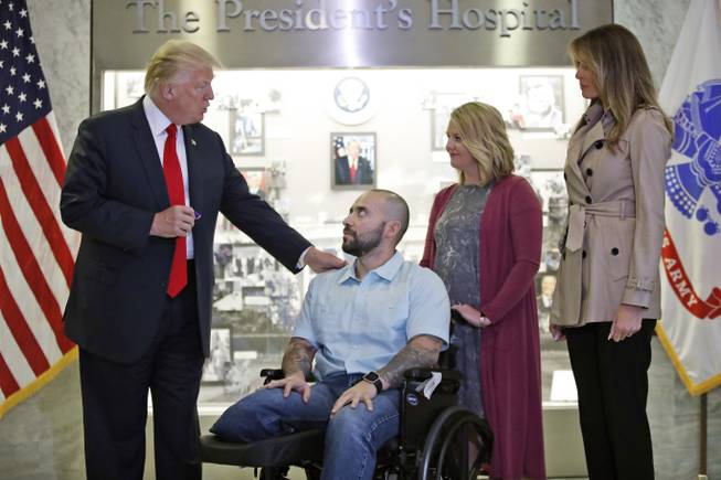 Trump awards Purple Heart to wounded Army sergeant