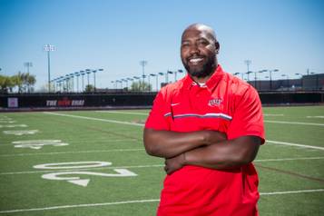 Former UNLV football player Jamaal Brimmer poses for a portait on the training field at UNLV, Wed. April 19, 2017.