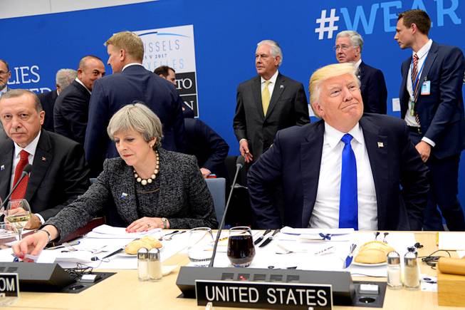 Trump appears to shove prime minister at North Atlantic Treaty Organisation summit