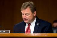 Sen. Dean Heller arrives as Federal Reserve Chair Janet Yellen testifies in front of the Senate Banking Committee in Washington, Tuesday, Feb. 14, 2017.