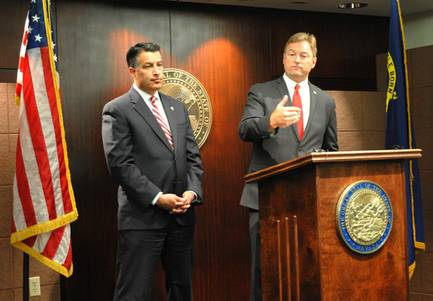 U.S. Sen. Dean Heller, R-Nev., and Nevada Gov. Brian Sandoval, left, conduct a joint news conference to discuss cuts to Medicaid proposed under a GOP health care law that would replace Obamacare.