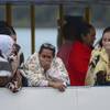 Photo: People who survived a sunken ferry cry as they wai Photo: People who survived a sunken ferry cry as they wai