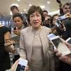 Photo: Sen. Susan Collins, R-Maine, is surrounded by repo Photo: Sen. Susan Collins, R-Maine, is surrounded by repo