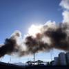 Photo: A view of smoke rising from a building fire Wednes Photo: A view of smoke rising from a building fire Wednes