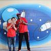 UNLV football player Jalil Briley surprised his fourth-grade teacher, Christopher Ho of Mabel Hoggard Elementary, with a gift basket during a visit as part of the Extra Yard for Teachers program run by the College Football Playoff. UNLV football player Jalil Briley surprised his fourth-grade teacher, Christopher Ho of Mabel Hoggard Elementary, with a gift basket during a visit as part of the Extra Yard for Teachers program run by the College Football Playoff.