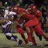 Photo: Legacy QB Roberto Valenzuela (5) is sacked by Arbo Photo: Legacy QB Roberto Valenzuela (5) is sacked by Arbo