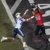 UNLV Rebels wide receiver Brandon Presley (80) secures touchdown pass over BYU Cougars defensive back Chris Wilcox (32) during their football game at Sam Boyd Stadium on Friday, Nov. 10, 2017. UNLV Rebels wide receiver Brandon Presley (80) secures touchdown pass over BYU Cougars defensive back Chris Wilcox (32) during their football game at Sam Boyd Stadium on Friday, Nov. 10, 2017.