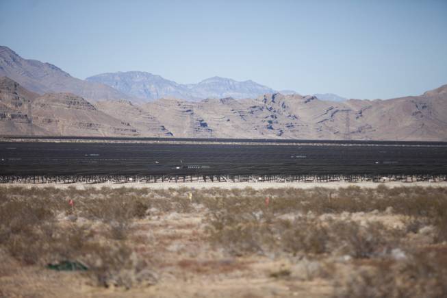 A partial view of the 1.98 million solar panels over the almost 1,979-acre project of the 179 megawatt Switch Station 1 and 2 Solar Projects is seen amidst the desert landscape, Monday, Dec. 11, 2017. This is the first-ever project to be built in one of the Bureau of Land Management's Solar Energy Zones.