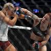 Photo: Women's featherweight champion Cris Cyborg, right, Photo: Women's featherweight champion Cris Cyborg, right,