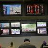 Photo: In this May 14, 2018, file photo, men watch horse Photo: In this May 14, 2018, file photo, men watch horse
