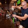 Photo: Chef Robert Irvine gets behind the bar at the seco Photo: Chef Robert Irvine gets behind the bar at the seco