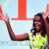 Photo: Former first lady Michelle Obama waves as she arri Photo: Former first lady Michelle Obama waves as she arri