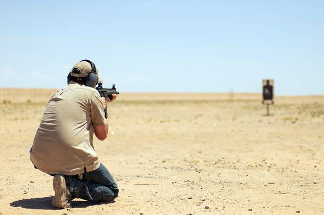 man shooting in desert man shooting in desert