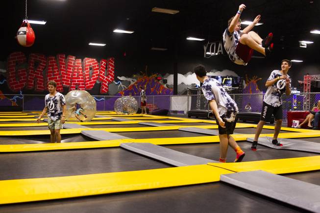 Influencers hang out during the second annual FlipCon event sponsored by Circus Trix at their park Gravady in Las Vegas, Monday, 23, 2018. FlipCon invites influencers from all over the U.S. to participate in SuperTramp activities to produce content for their fan base and to network with fellow influencers.