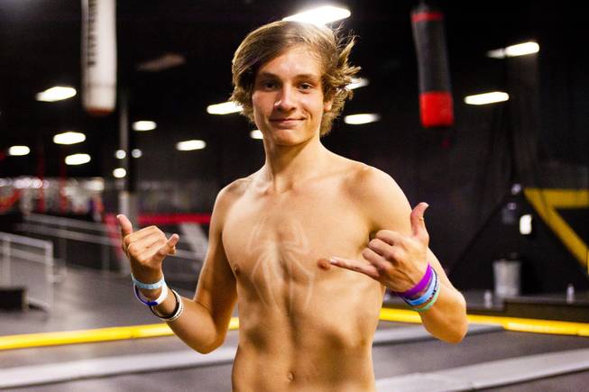 Influencer Park Linnarz (instagram @parker.linnarz) poses for a photo with his spiderman logo tan outline on his chest during the second annual FlipCon event sponsored by Circus Trix at their park Gravady in Las Vegas, Monday, 23, 2018. FlipCon invites influencers from all over the U.S. to participate in SuperTramp activities to produce content for their fan base and to network with fellow influencers.