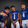 Photo: Members of the Liberty High football team pose for Photo: Members of the Liberty High football team pose for
