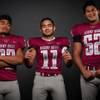 Photo: Members of the Desert Oasis High football team pos Photo: Members of the Desert Oasis High football team pos