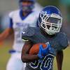 Photo: Green Valley running back Maaliek Duncan runs in f Photo: Green Valley running back Maaliek Duncan runs in f