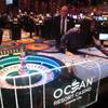In this Sept. 28, 2018, photo, a dealer pushes a stack of chips toward a gambler at the Ocean Resort Casino in Atlantic City N.J. The Ocean Resort and the Hard Rock casino both mark their 100th day of operation on Thursday, Oct. 4. In this Sept. 28, 2018, photo, a dealer pushes a stack of chips toward a gambler at the Ocean Resort Casino in Atlantic City N.J. The Ocean Resort and the Hard Rock casino both mark their 100th day of operation on Thursday, Oct. 4.