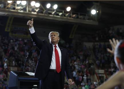 President Donald Trump gives the thumbs-up as he finishes speaking in April 2017 at the Pennsylvania Farm Show Complex and Expo Center in Harrisburg, Pa. Today marks the second anniversary of Trump’s inauguration, and the nation is divided on whether to give the president a thumbs-up or a thumbs-down on his first two years in office.