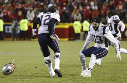 New England Patriots quarterback Tom Brady (12) celebrates with middle linebacker Kyle Van Noy (53) after defeating the Kansas City Chiefs in AFC Championship NFL football game in overtime, Sunday, Jan. 20, 2019, in Kansas City, Mo.