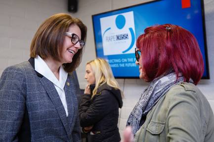 Sen. Catherine Cortez Masto chats with a guest at a ribbon-cutting ceremony for the new Rape Crisis Center, Tuesday, Feb. 19, 2019.
