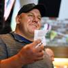 Photo: James Adducci holds up his winning ticket after wi Photo: James Adducci holds up his winning ticket after wi