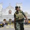 Photo: Sri Lankan Army soldiers secure the area around St Photo: Sri Lankan Army soldiers secure the area around St