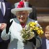 Photo: Britain's Queen Elizabeth II waves to the public a Photo: Britain's Queen Elizabeth II waves to the public a