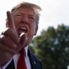 Photo: President Donald Trump talks with reporters before Photo: President Donald Trump talks with reporters before