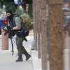 Photo: An armed shooter stands near the Earle Cabell Fede Photo: An armed shooter stands near the Earle Cabell Fede