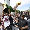 Photo: Toronto Raptors guard Kyle Lowry, left, holds the Photo: Toronto Raptors guard Kyle Lowry, left, holds the