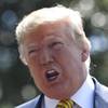 Photo: President Donald Trump speaks to reporters on the Photo: President Donald Trump speaks to reporters on the