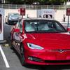 Photo: A Tesla vehicle is parked at a new Tesla Superchar Photo: A Tesla vehicle is parked at a new Tesla Superchar