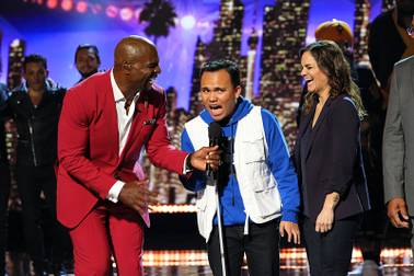 This Wednesday, Aug. 14, 2019 photo provided by NBC shows host Terry Crews, left, and singer Kodi Lee on the NBC television show, "America's Got Talent," in Los Angeles. With the top two most-watched television shows last week, NBC's "America's Got Talent'" continues its dominance when the heat is on. It's the summer's most-watched television series for six summers in a row.