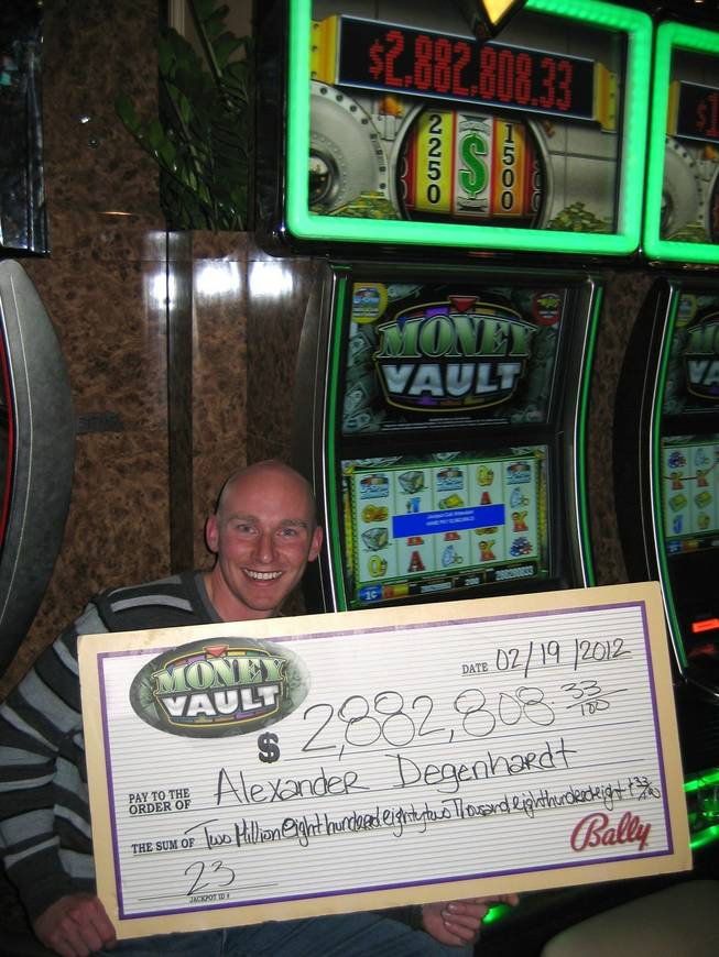Alexander Degenhardt, a U.S. Marine stationed in Washington, D.C., won a $2.8 million progressive slot machine jackpot Sunday, Feb. 19, 2012, at the Bellagio.