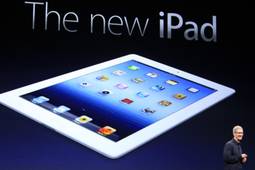 Apple CEO Tim Cook introduces the new iPad during an event in San Francisco, Wednesday, March 7, 2012. The new iPad model features a sharper screen and a faster processor.  Apple says the new display will be even sharper than the high-definition television set in the living room.