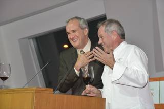 Chef Wolfgang Puck, right, with Larry Ruvo, launches four wines to benefit Keep Memory Alive.