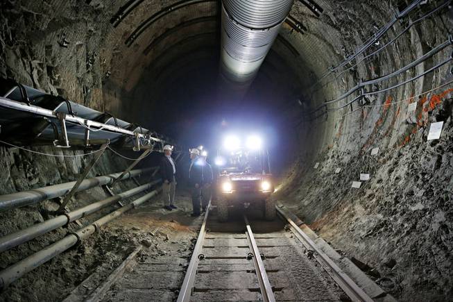 Congressmen, including Jerry McNerney, D-Calif., left, and Rep. John Shimkus, R-Ill., second from left, tour Yucca Mountain, Thursday, April 9, 2015, near Mercury. Several members of Congress toured the proposed radioactive waste dump 90 miles northwest of Las Vegas. 