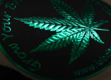 Promotional stickers are displayed by a vendor during the 5th Annual Marijuana Business Conference & Expo at the Rio Hotel and Casino, Wednesday, Nov. 16,&nbsp;2016.