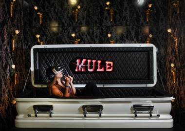Ashely Warnick of Los Angeles, California, reacts to the darkness of the Mule 360 Video Project while sitting in an actual casket during the Virtual Reality Festival featuring exhibits/demos and panel discussions at the Las Vegas Production Studios on Friday, Jan. 6,&nbsp;2017.